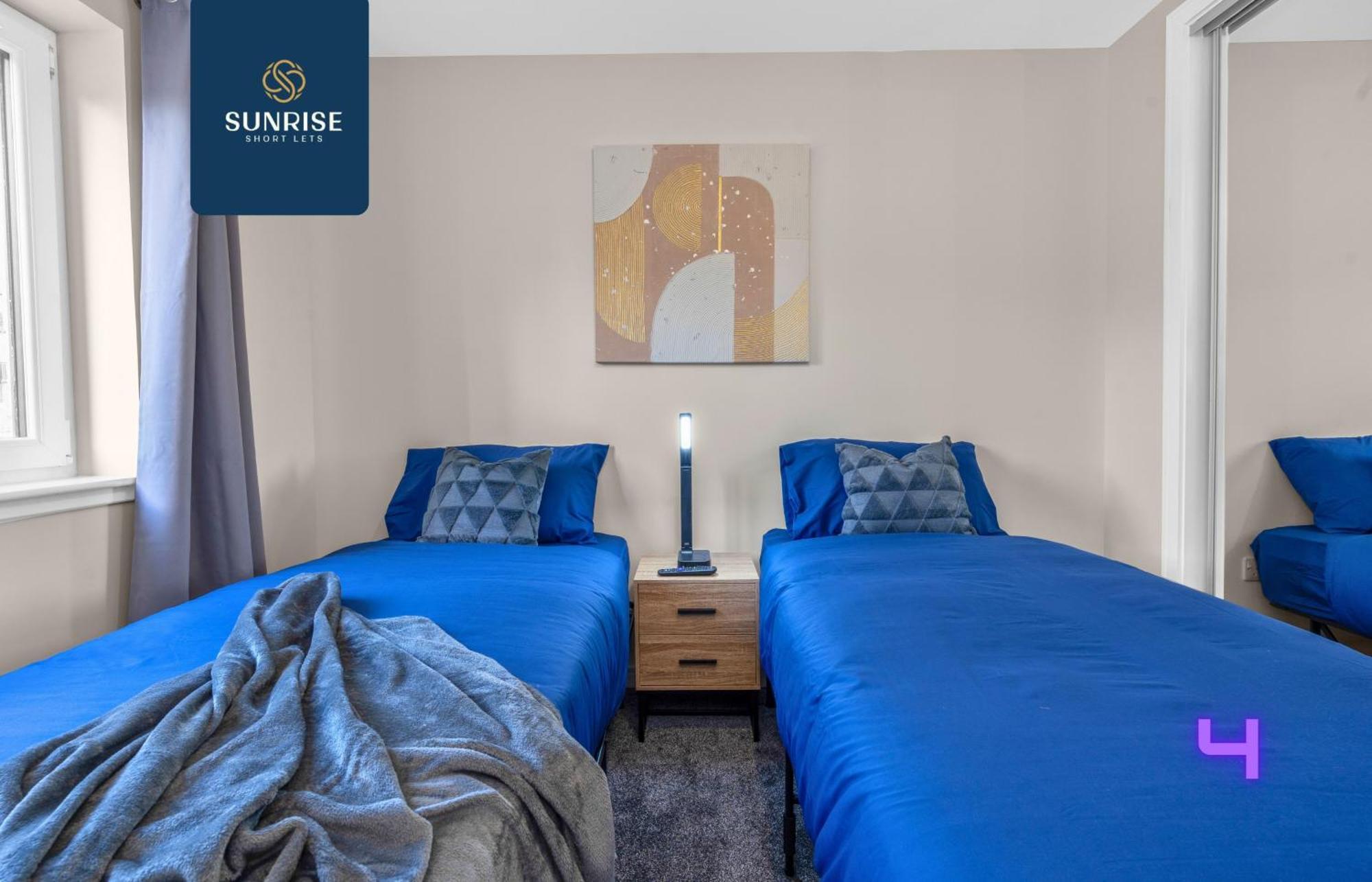L2 - Stunning 4 Bed House With 6 Beds And 3 Bathrooms, Tvs In Each Room, Free Parking, Fully Equipped, Local Amenities, Easy Ring Road Access, Special Rates And Price Match Gaurantee Ask Sunrise Short Lets *